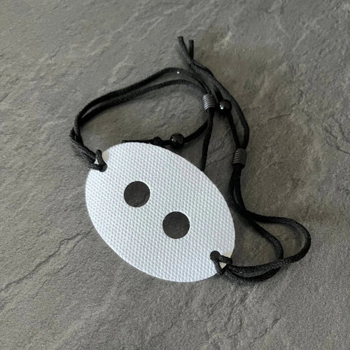 Cordon de maintien du patch